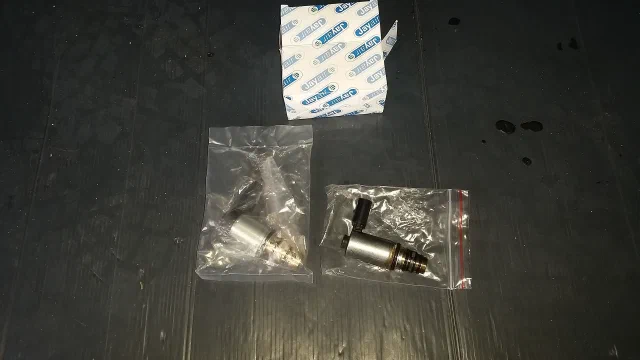 Aircon compressor control valve replacement: valve beside its packaging