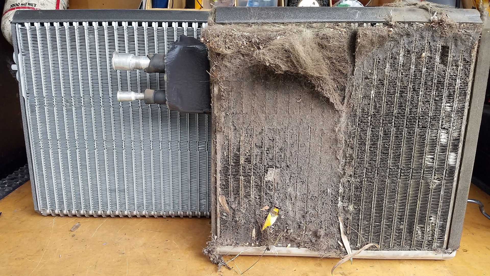 Debris-covered evaporator beside a clean replacement | atmechanical | Perth